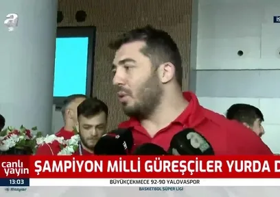 Şampiyon güreşçilerimiz yurda döndü