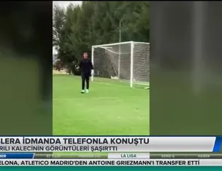 Muslera idmanda telefonla konuştu