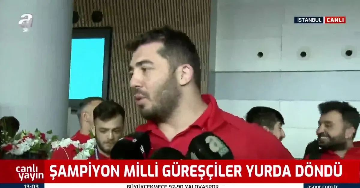 Şampiyon güreşçilerimiz yurda döndü